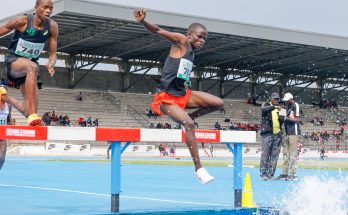 Brian Kiptoo (R) clears the water jump barrier in the men's 2000m Sc u18 race at Africa U18/20 trials in Nakuru