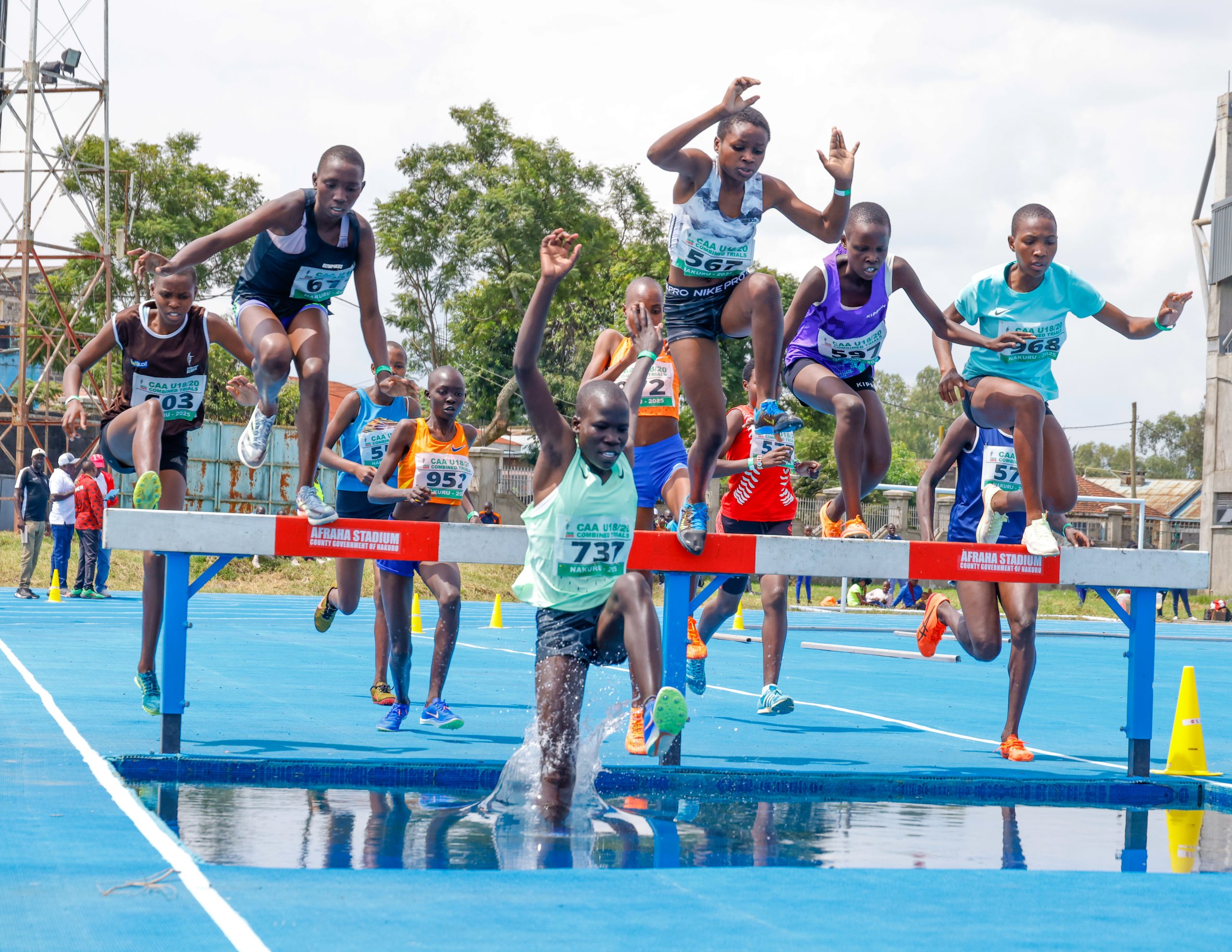 Girls taking part in the 2000m steeplechase at Afraha stadium