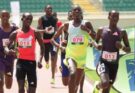 Under-20 athletes racing at Nyayo Stadium.