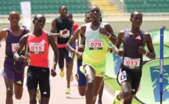 Under-20 athletes racing at Nyayo Stadium.