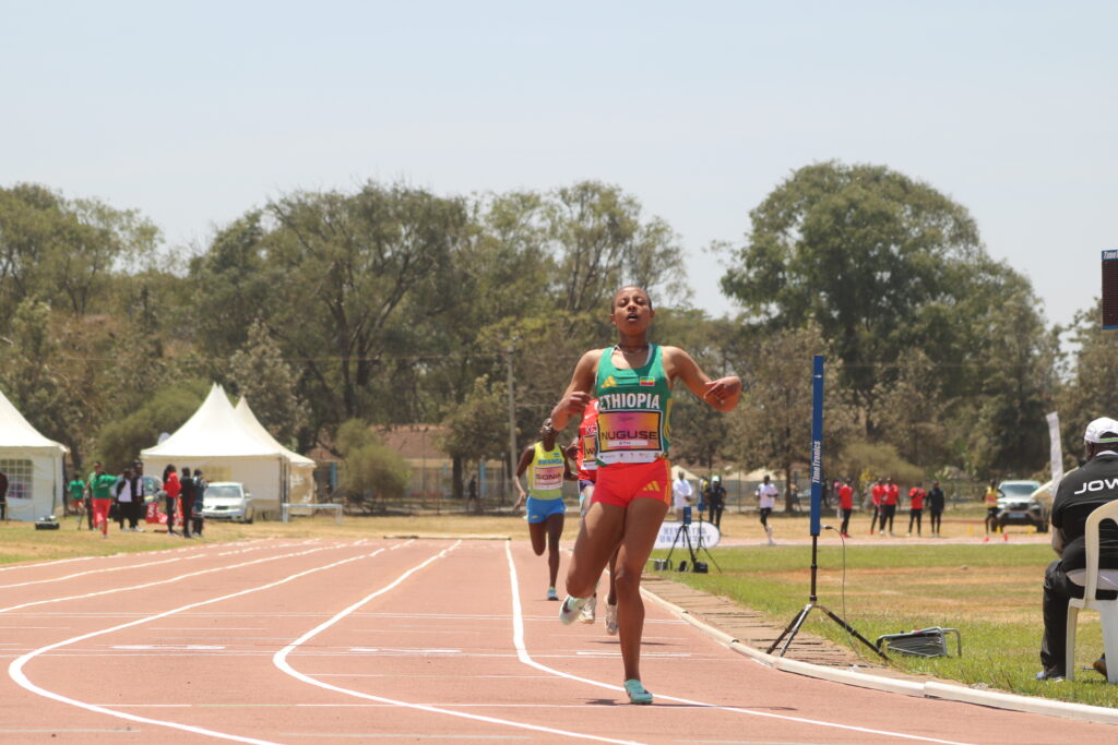 Yordanos wins the girls’ 3000m.