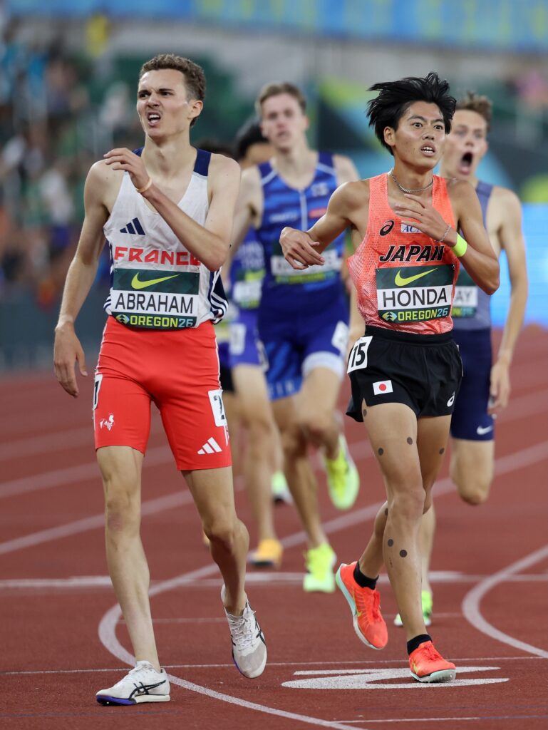 Alois Abraham and Ojiro Honda after winning silver and bronze in the 3000m final
